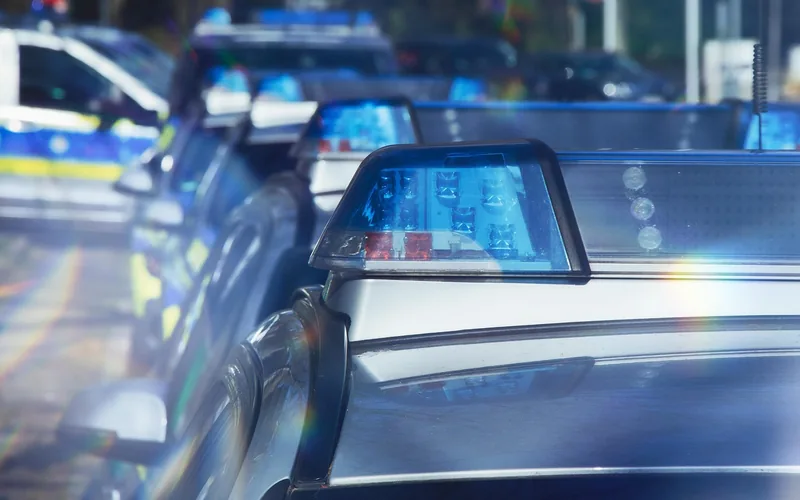 Police patrol car used for traffic stops, where officers verify proof of insurance during routine checks Police patrol car used for traffic stops, where officers verify proof of insurance during routine checks