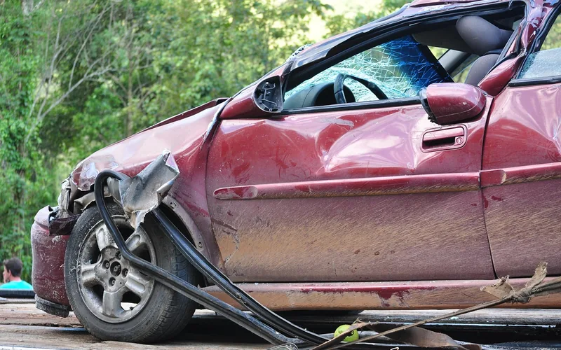 damaged vehicle after a collision illustrating real-world crash outcomes