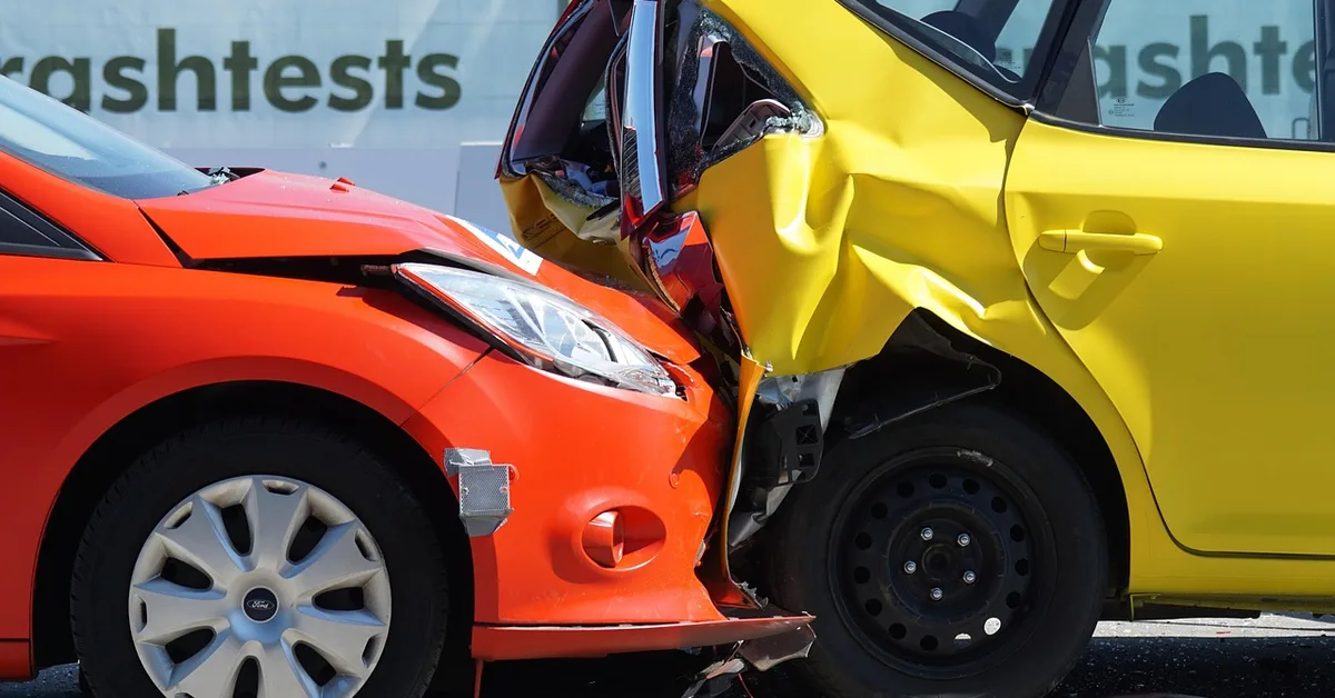 Car insurance claim scene after a collision, tied to accident-rate pricing