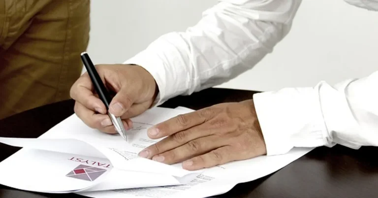 Signing car loan financing documents