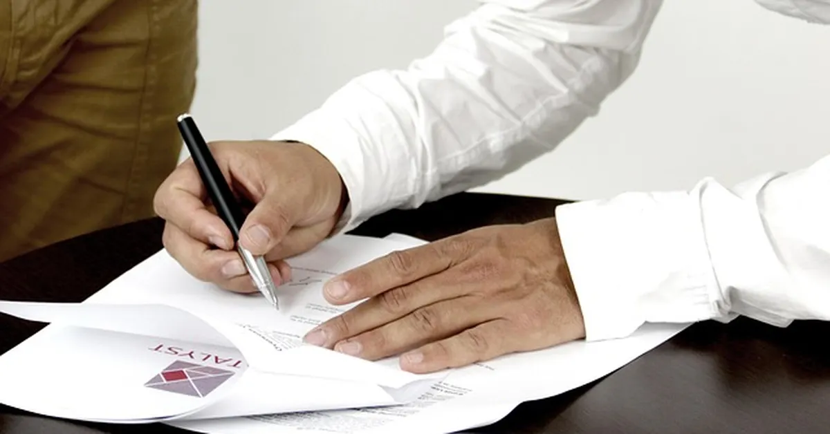 Signing car loan financing documents
