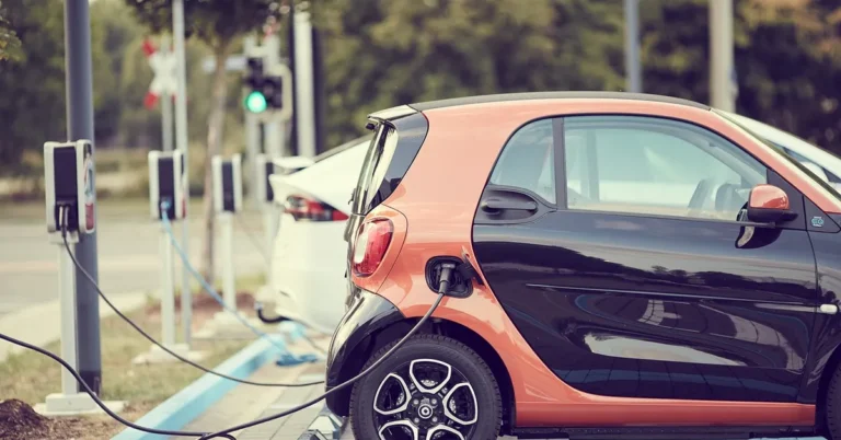 Compact car parked at a carsharing station representing Uber Car Share rentals