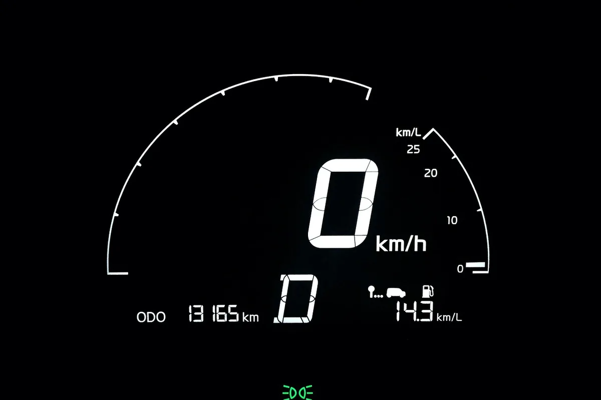 More gears keep the engine closer to its efficient RPM range Car tachometer and speedometer gauge showing engine RPM