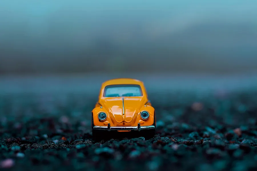 Close-up of a small die-cast toy car, the scale-model format used for Cars 3 collectibles
