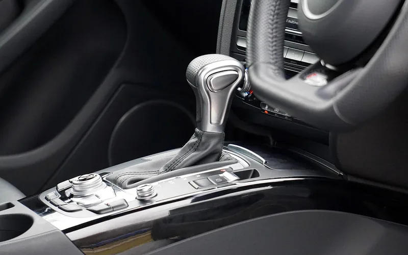 Automatic transmission gear selector lever on a car center console