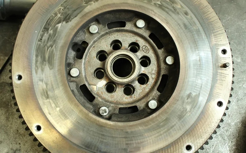 Flywheel face with wear marks, removed from a vehicle