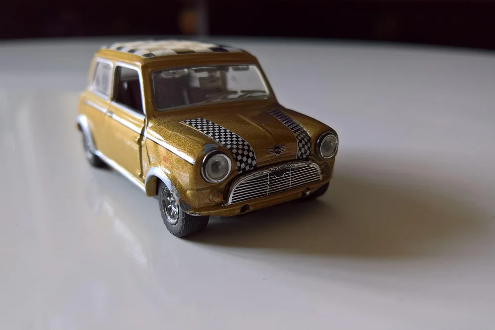 Die-cast model race car, a popular souvenir sold at IndyCar race day merchandise stands
