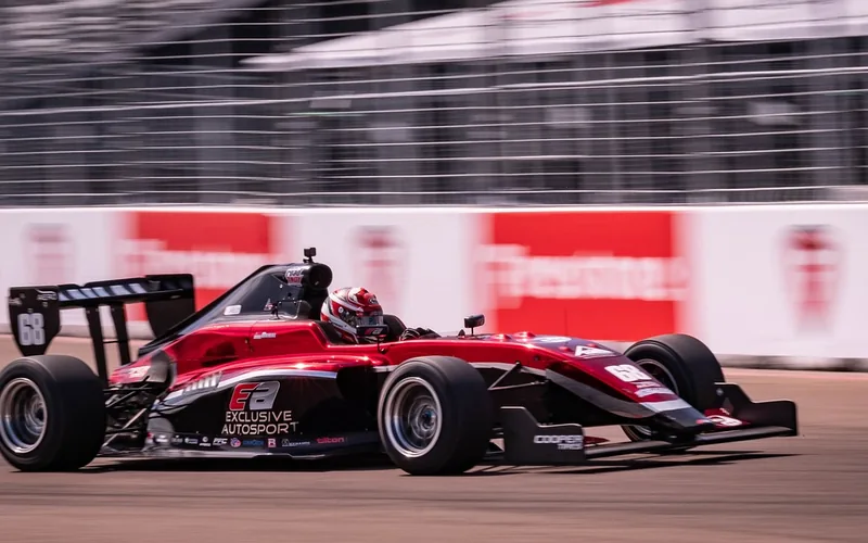 IndyCar open-wheel race car on a speedway