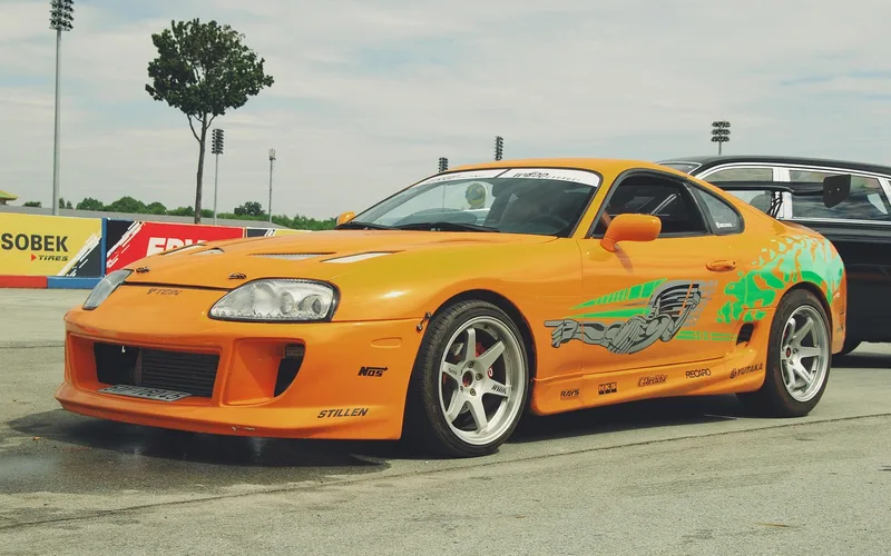 Orange sports car styled after the iconic Fast and Furious Toyota Supra Orange sports car styled after the iconic Fast and Furious Toyota Supra