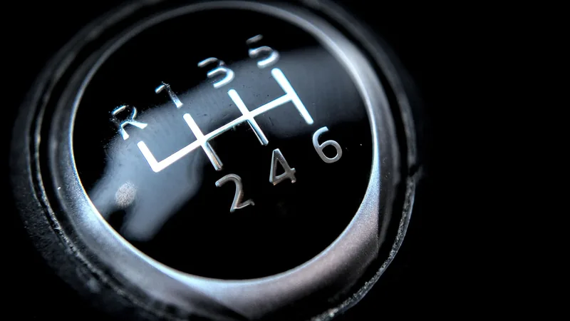 Six-speed manual gear shift knob with the shift pattern printed on top