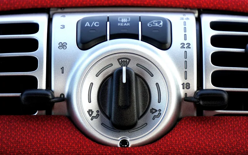 Car dashboard air conditioning vents and climate control panel