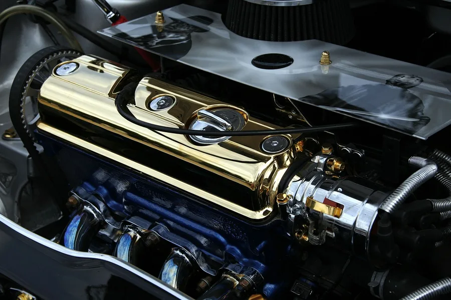 car engine bay AC compressor