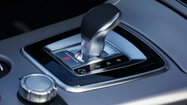 Automatic transmission shift lever with P, R, N and D positions on a car center console