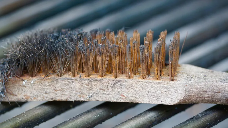 Steel wire brush with rust-stained bristles Steel wire brush with rust-stained bristles