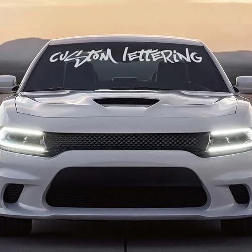 AnewDecals custom windshield decal reading CUSTOM LETTERING across a white Dodge Charger windshield
