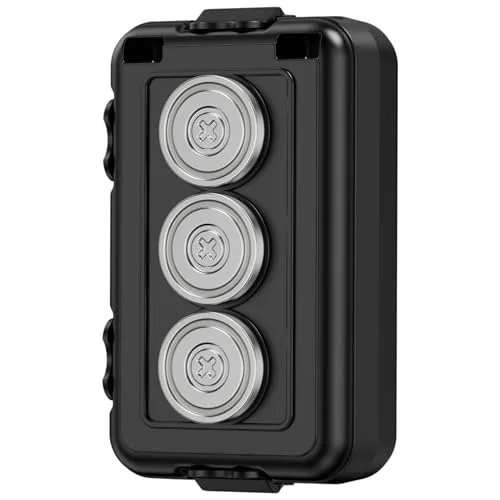 Black magnetic hide-a-key box with three round magnets, used to stash a spare car key