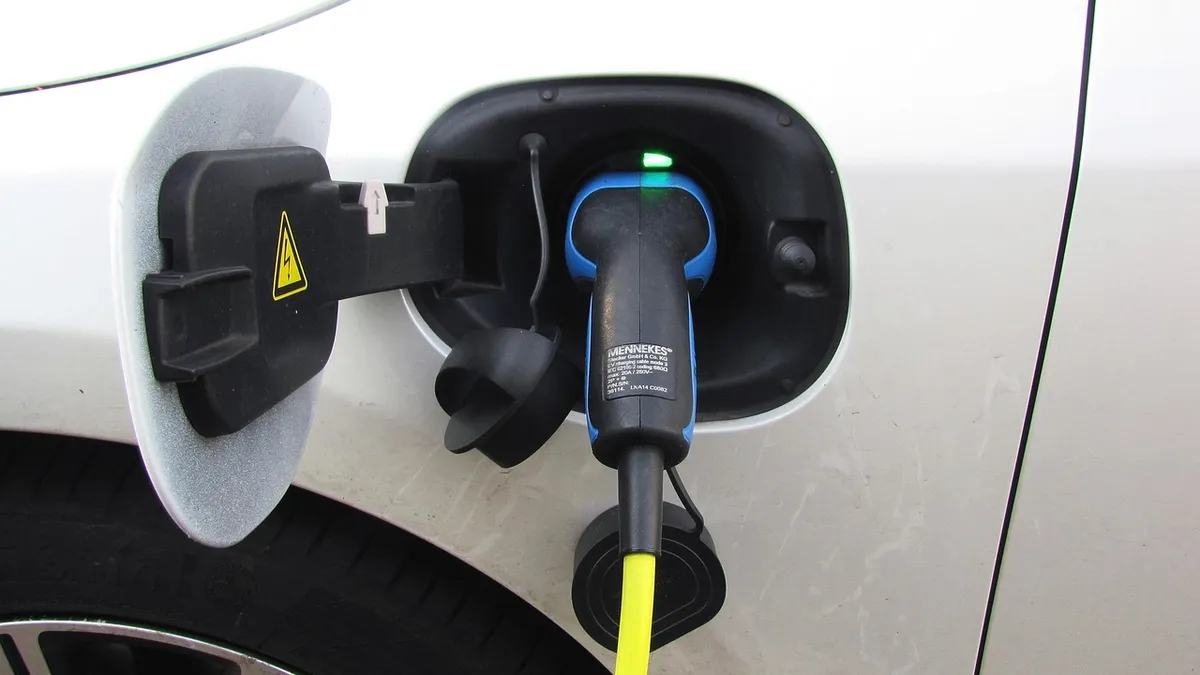 Plug-in hybrid charging cable connected to a car's charging port
