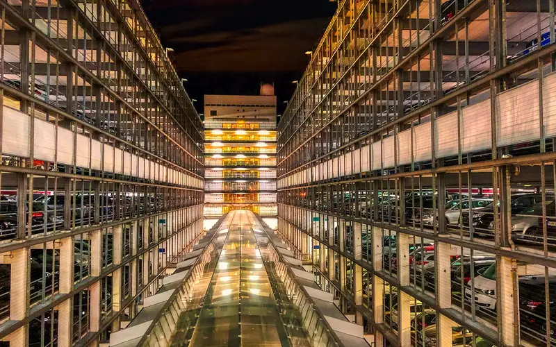 Multi-level parking garage lit up at night, the kind of low-light environment puddle lights are designed for Multi-level parking garage lit up at night, the kind of low-light environment puddle lights are designed for