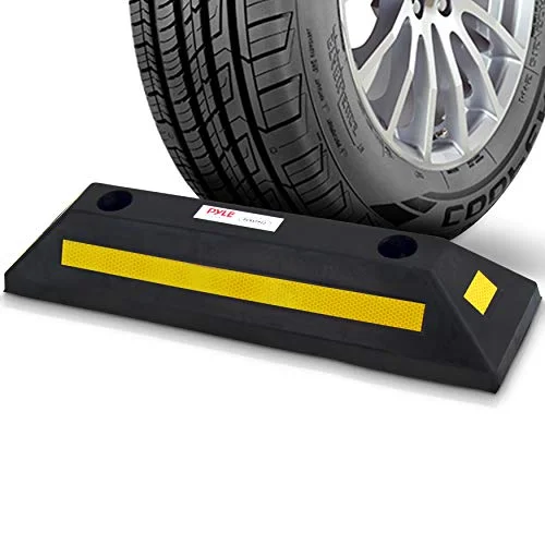 Pyle Curb Garage Vehicle Floor Stopper, a single black rubber parking block with a yellow reflective stripe, placed on a garage floor next to a car tire