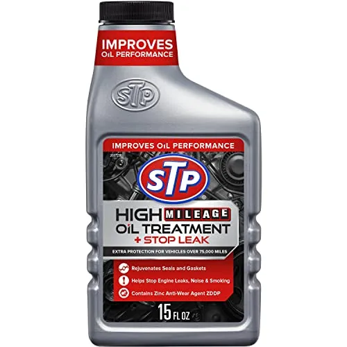 STP High Mileage Oil Treatment plus Stop Leak bottle, 15 fluid ounces