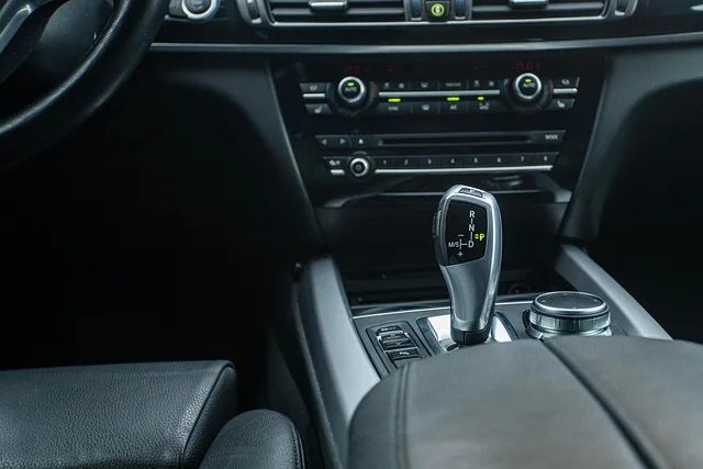 Automatic gear shifter showing R N D P positions with an M/S manual and sport mode toggle switch
