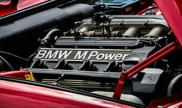 Open car engine bay showing engine block and cooling components