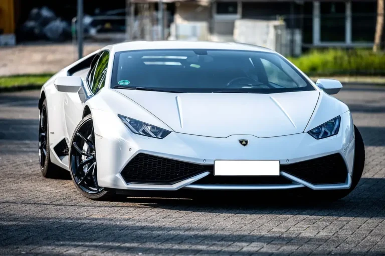 White supercar parked on a paved lot, a real-world stand-in for the cool cars you hunt in GTA 5 Story Mode