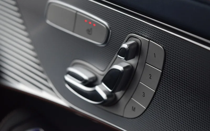 Electrically adjustable front seat in a luxury car equipped with memory seat and seat heating functions Electrically adjustable front seat in a luxury car equipped with memory seat and seat heating functions