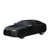 Black waterproof sedan car cover with green reflective strips