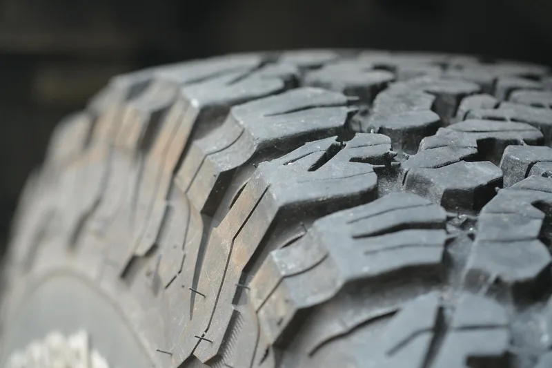 Close-up of a worn tire tread on a vehicle
