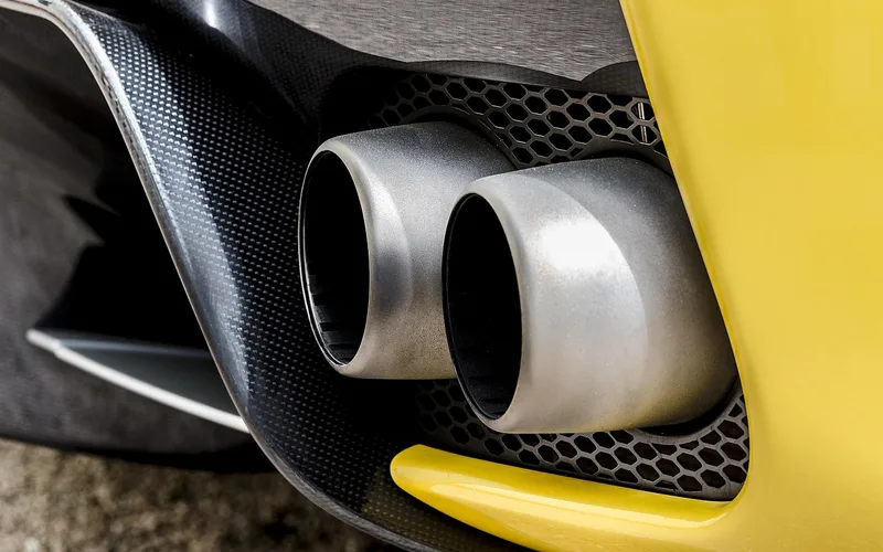 Exhaust and catalytic converter system visible underneath a car
