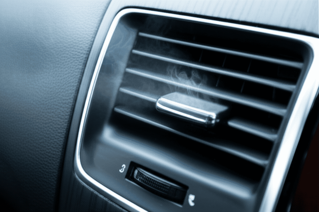 Generate a high-quality, relevant image prompt for an article about: Why Does My Car AC Blow Cold Th