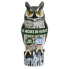Hand-painted plastic great horned owl decoy used as a bird deterrent