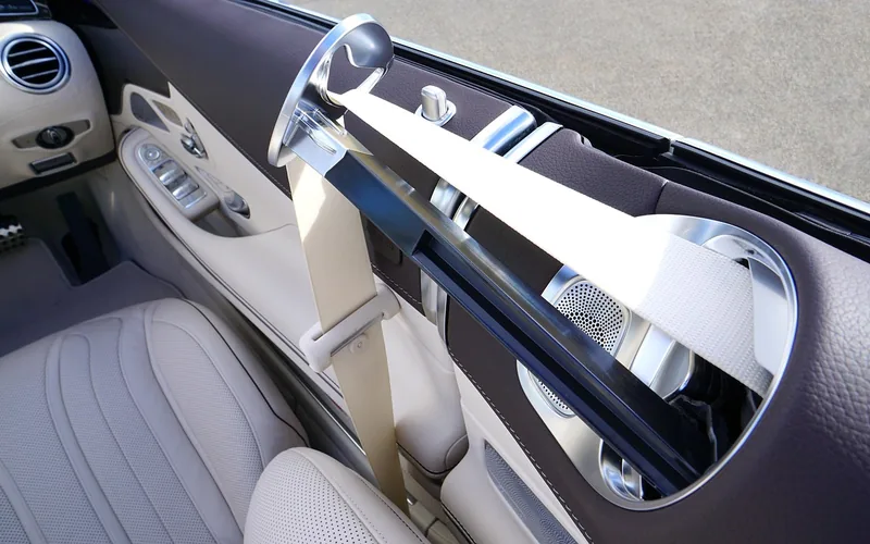 close-up of a vehicle seat belt and seat inside a car used to lock a car seat in place close-up of a vehicle seat belt and seat inside a car used to lock a car seat in place