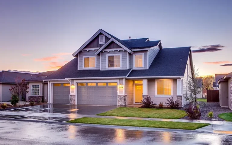 Suburban home with an attached enclosed garage and driveway