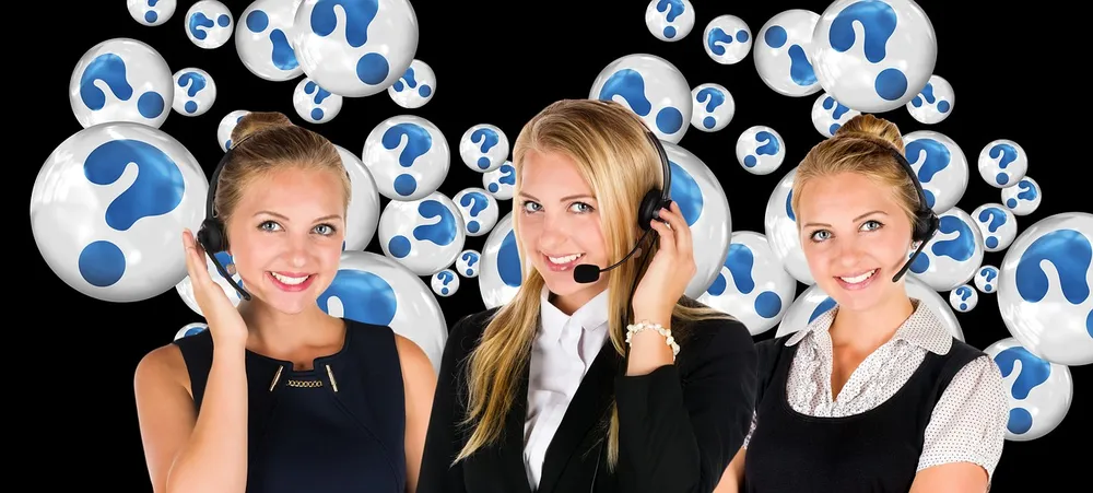 Three customer service agents wearing headsets against a black background with question mark bubbles