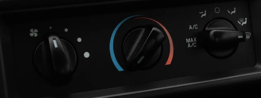 Manual car climate control knobs for fan speed, temperature and A/C mode