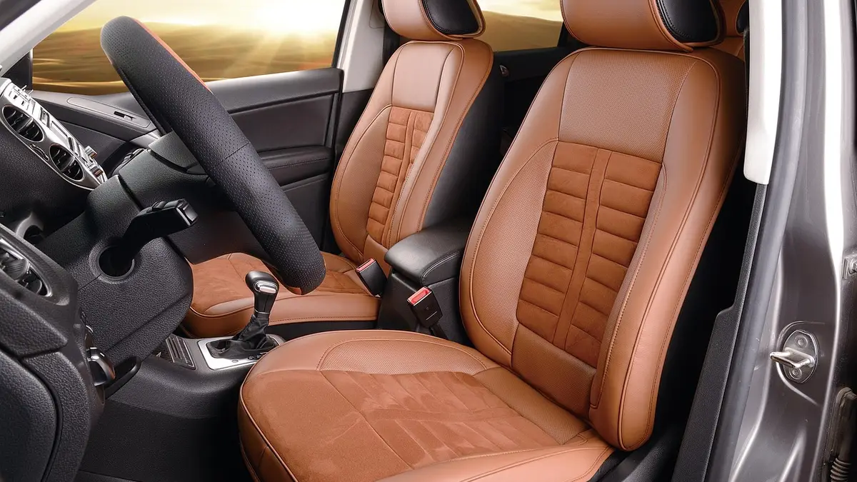 Close-up of a clean leather car seat interior before repair