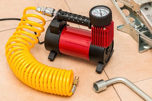 Portable 12V tire inflator with digital pressure gauge