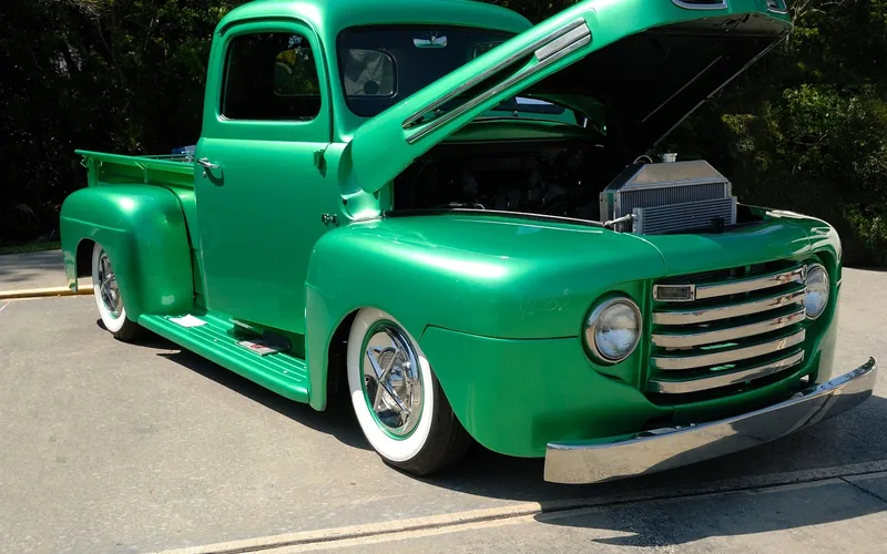 A heavily customized show truck at a modern car show