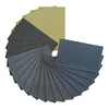 Dura-Gold wet or dry sandpaper sheets in assorted grits fanned out