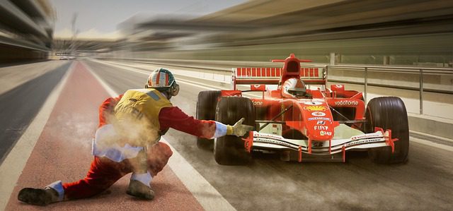 Formula 1 race cars following a course marshal vehicle on track