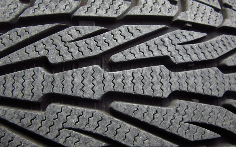 Close-up of a tire tread pattern showing the grooves
