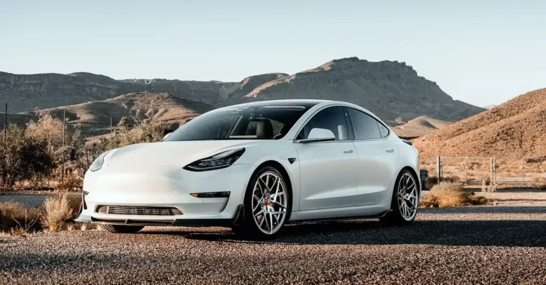 Low-slung sports sedan with a wide stance that keeps its center of gravity close to the ground