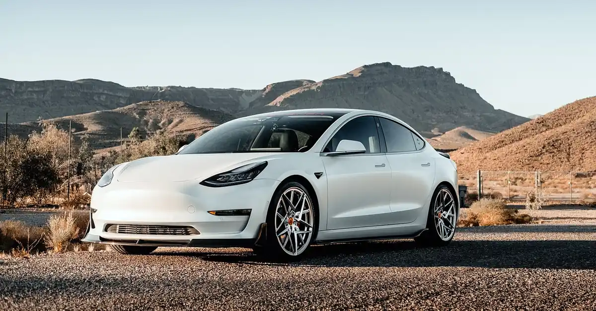 Low-slung sports sedan with a wide stance that keeps its center of gravity close to the ground