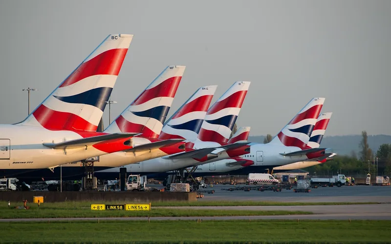 Aircraft parked at gates at London Heathrow Airport terminal