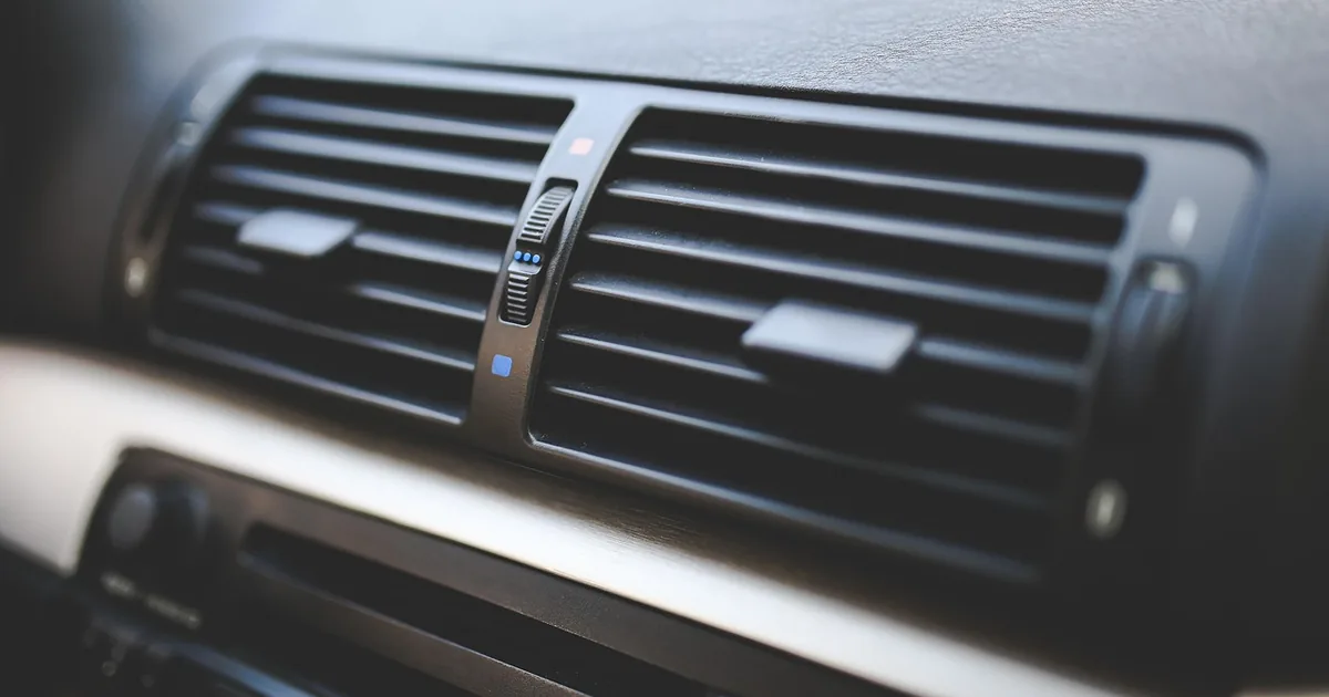 Car dashboard air vents close-up