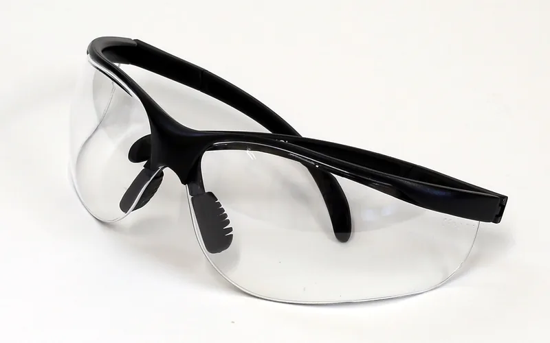 Clear safety glasses with a black frame