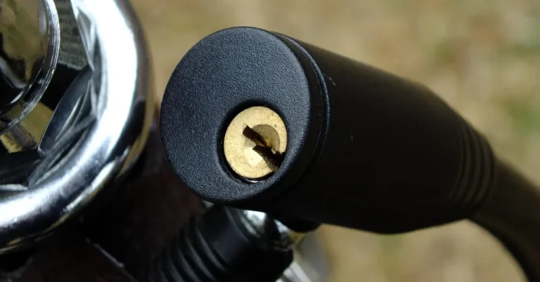 Close-up of a keyed lock on a vehicle anti-theft device