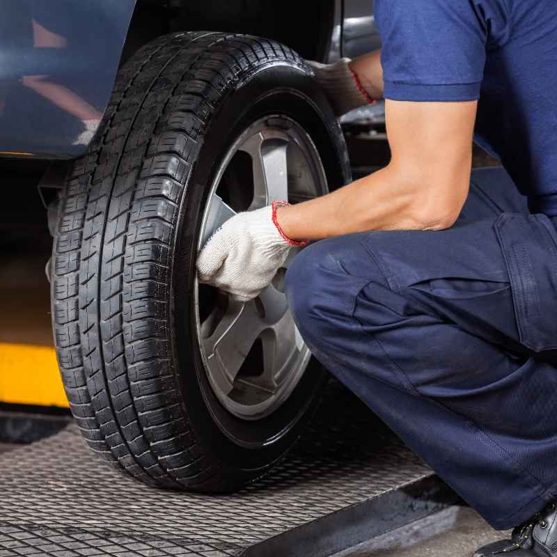 How To Jack Up A Car To Change A Tire Safely & Quickly